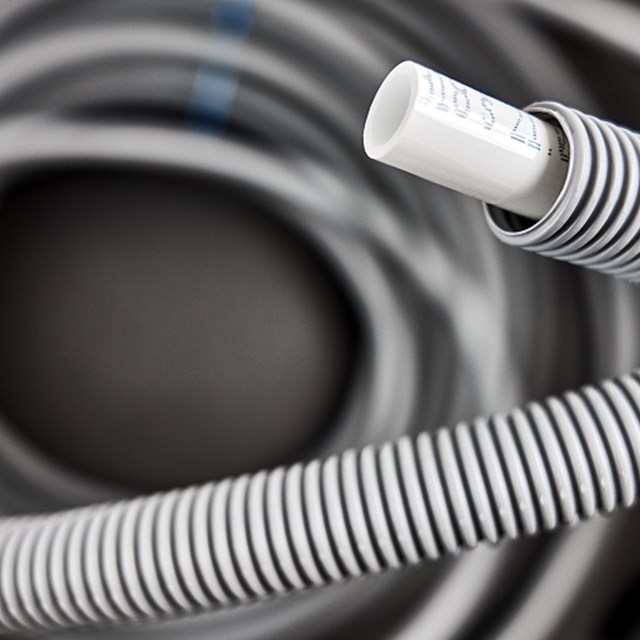 White pipe in grey pipe